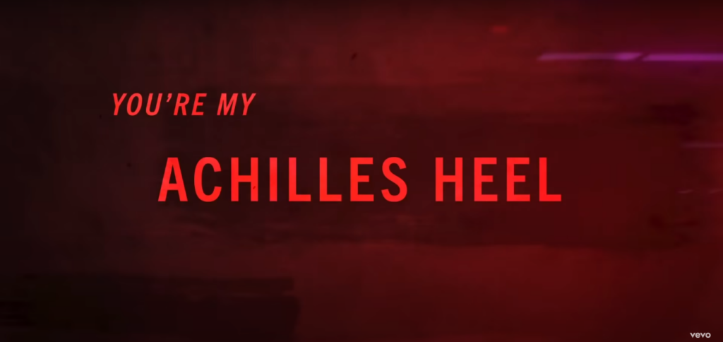 Achilles HeelIdiom achilles heel terdapat di lirik lagu State of Grace, tepatnya pada “You’re my achilles heel”. Berdasarkan kamus online Merriam-Webster, idiom achilles heel dapat bermakna titik kelemahan seseorang. Jadi, lirik “You’re my achilles heel” dapat diartikan sebagai “Anda adalah kelemahan saya”.