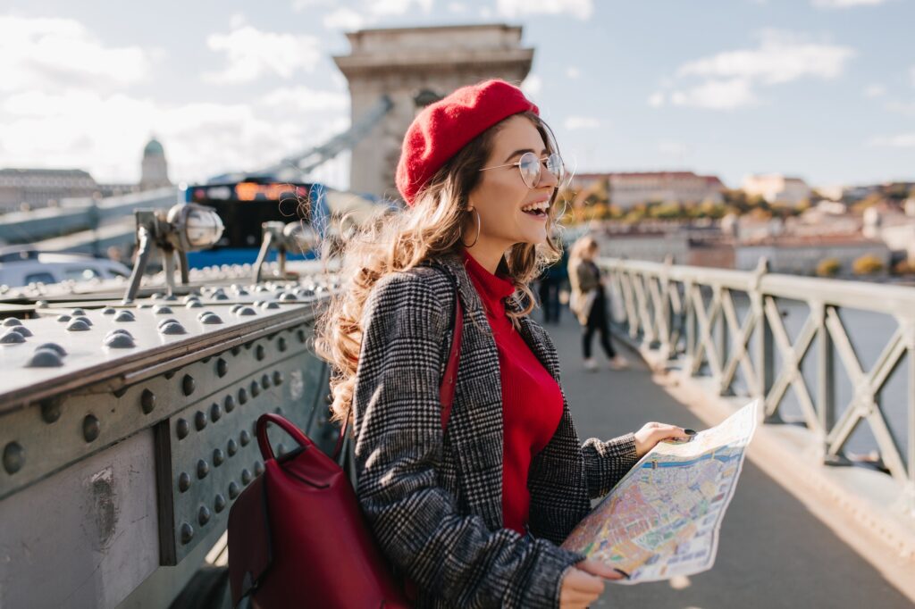 spectacular-european-female-tourist-spending-time-city-enjoying-vacation